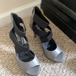 Grey open toe heels.